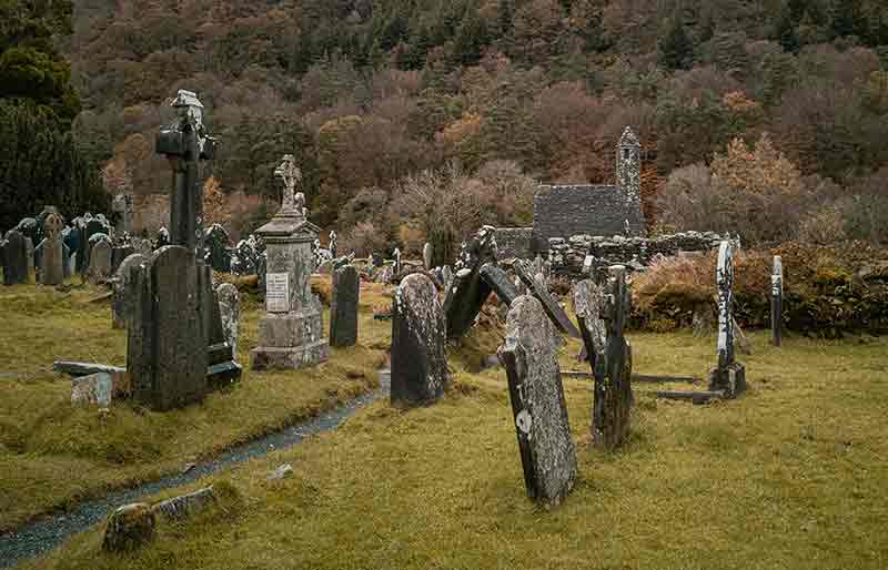 Tombstones in St Kevin's Church graveyard .