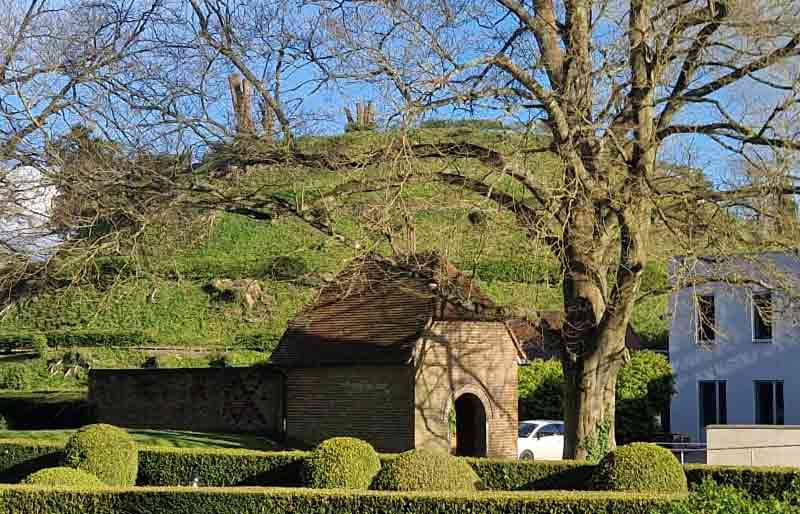 Giant stepped hill earthwork covered in grass..